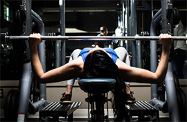 Image of person lifting weights