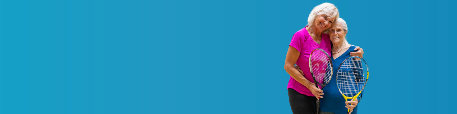 The Recreation Guide Cover has two people smiling with their arms around each other and holding badminton rackets