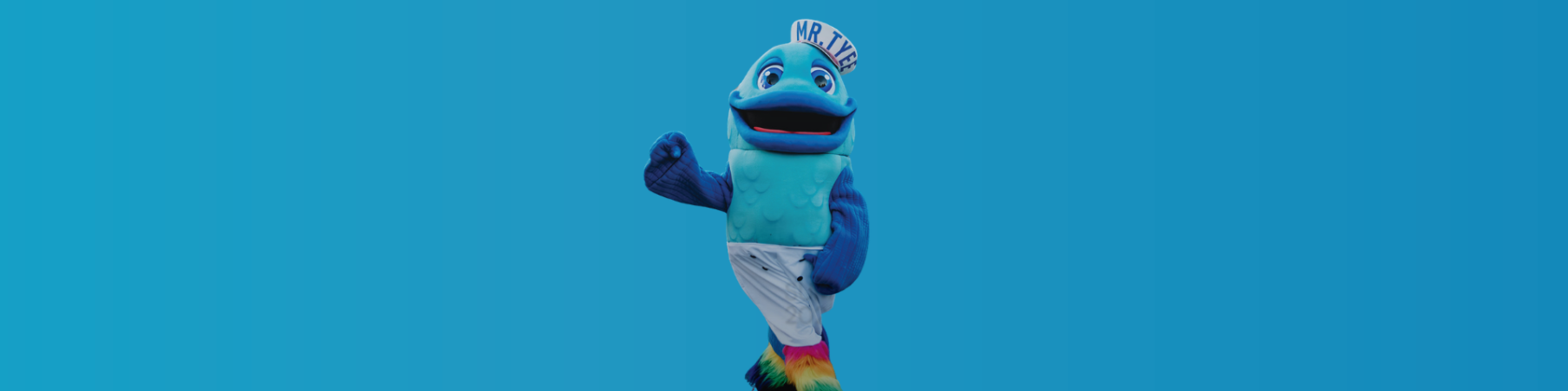 The Recreation Guide Cover has an image of Mr. Tyee waving at the camera at a CR Live Streets event.