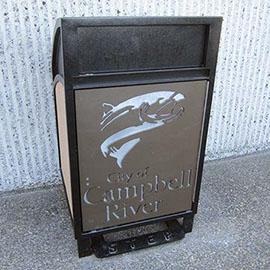 Waste bin with Campbell River logo and fish graphic.