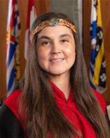 Tanille Johnston, a member of the Council, poses for a photo in a portrait-style format.